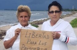 Las Damas de Blanco Leticia Ramos Herrería (der.) y Odalis Hernández.