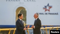 Marco Rubio and the administrator of the Panama Canal Authority, Ricaurte Vásquez, talk during a tour of the Miraflores locks in Panama City, on February 2, 2025. (Mark Schiefelbein, Reuters)