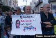 Palestinos protestan con carteles que rezan: "Blinken, tienes sangre en las manos".