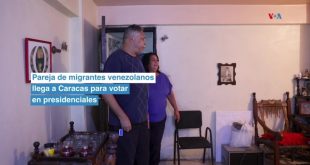 Pareja de migrantes venezolanos llega a Caracas para votar en presidenciales